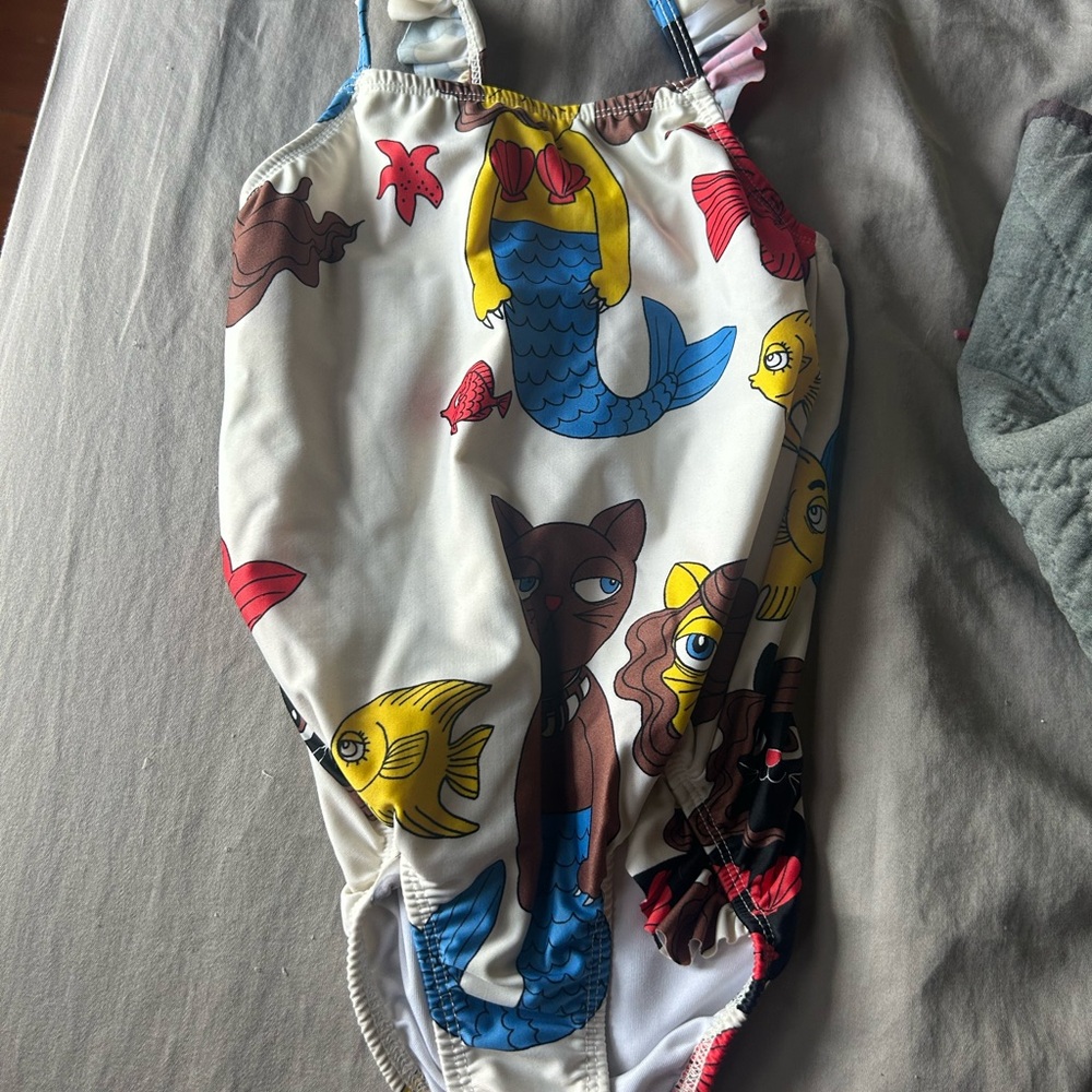 Mini Rodini Organic Swimsuit with mermaid cat print.